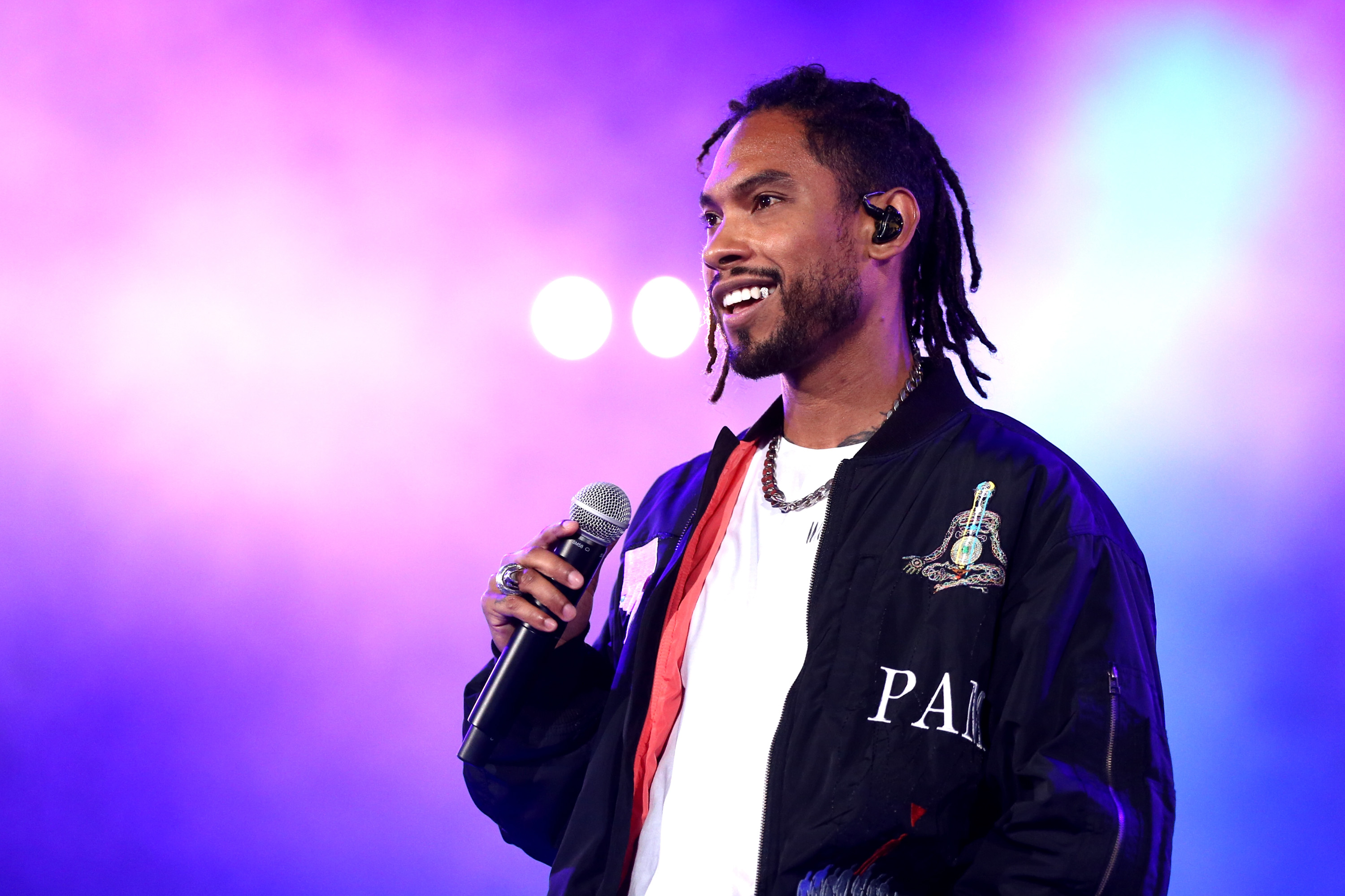 Miguel performing on tour
